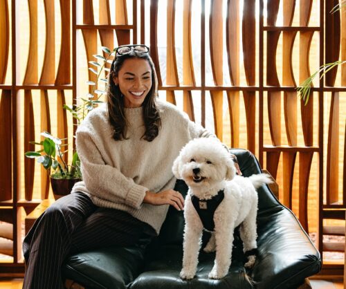 Woman with dog at the Wilde Resort & Spa
