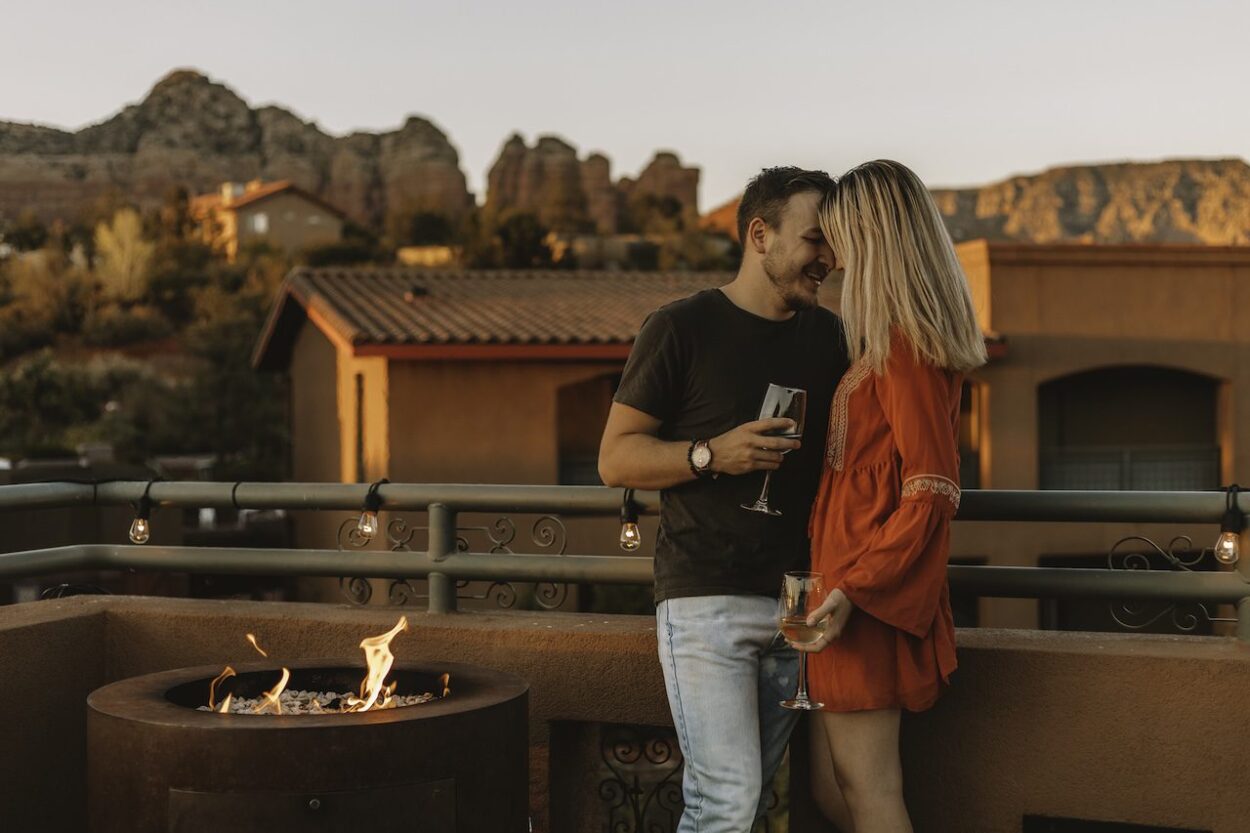 couple embracing on a balcony