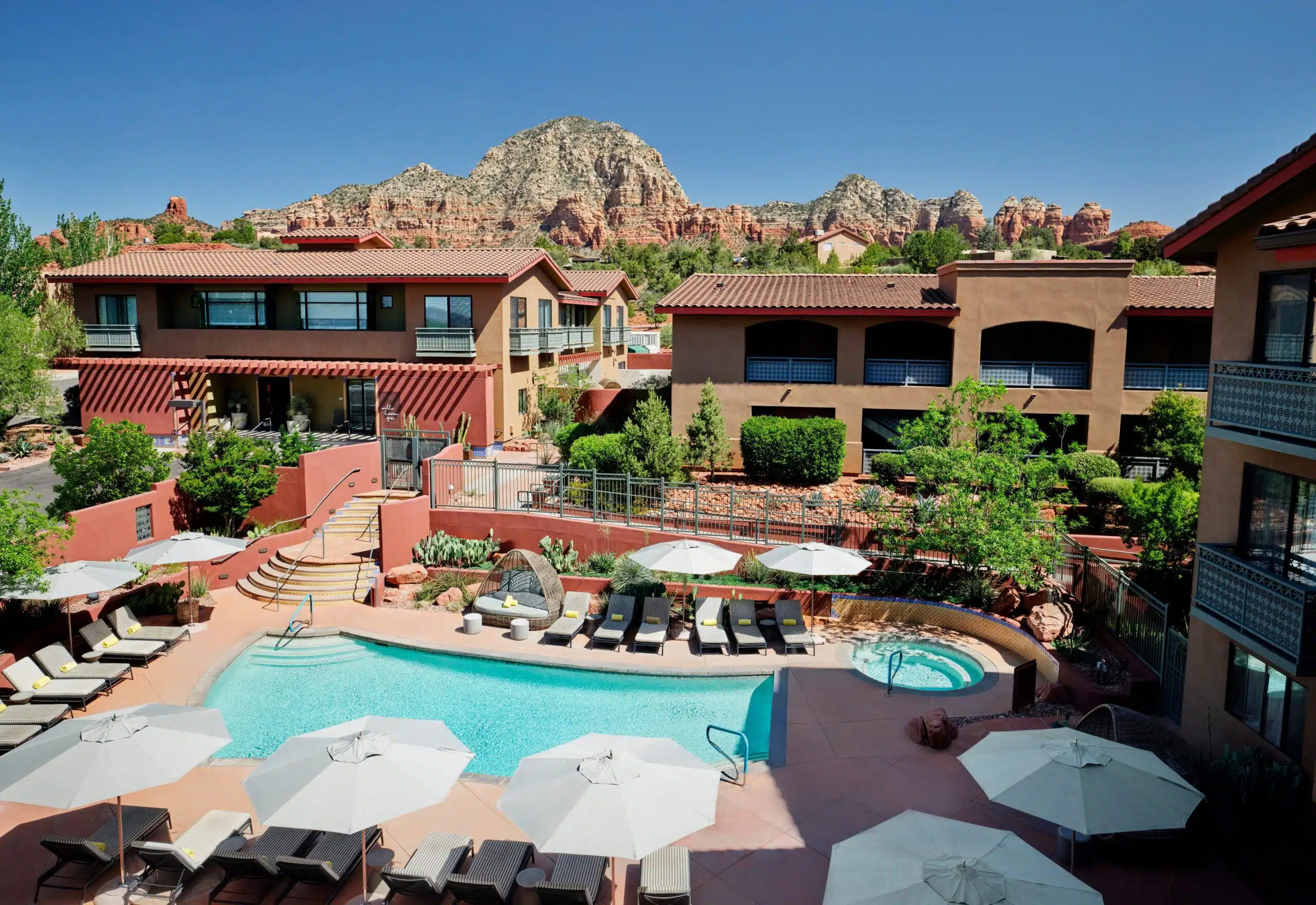aerial view of outdoor pool and jacuzzi area