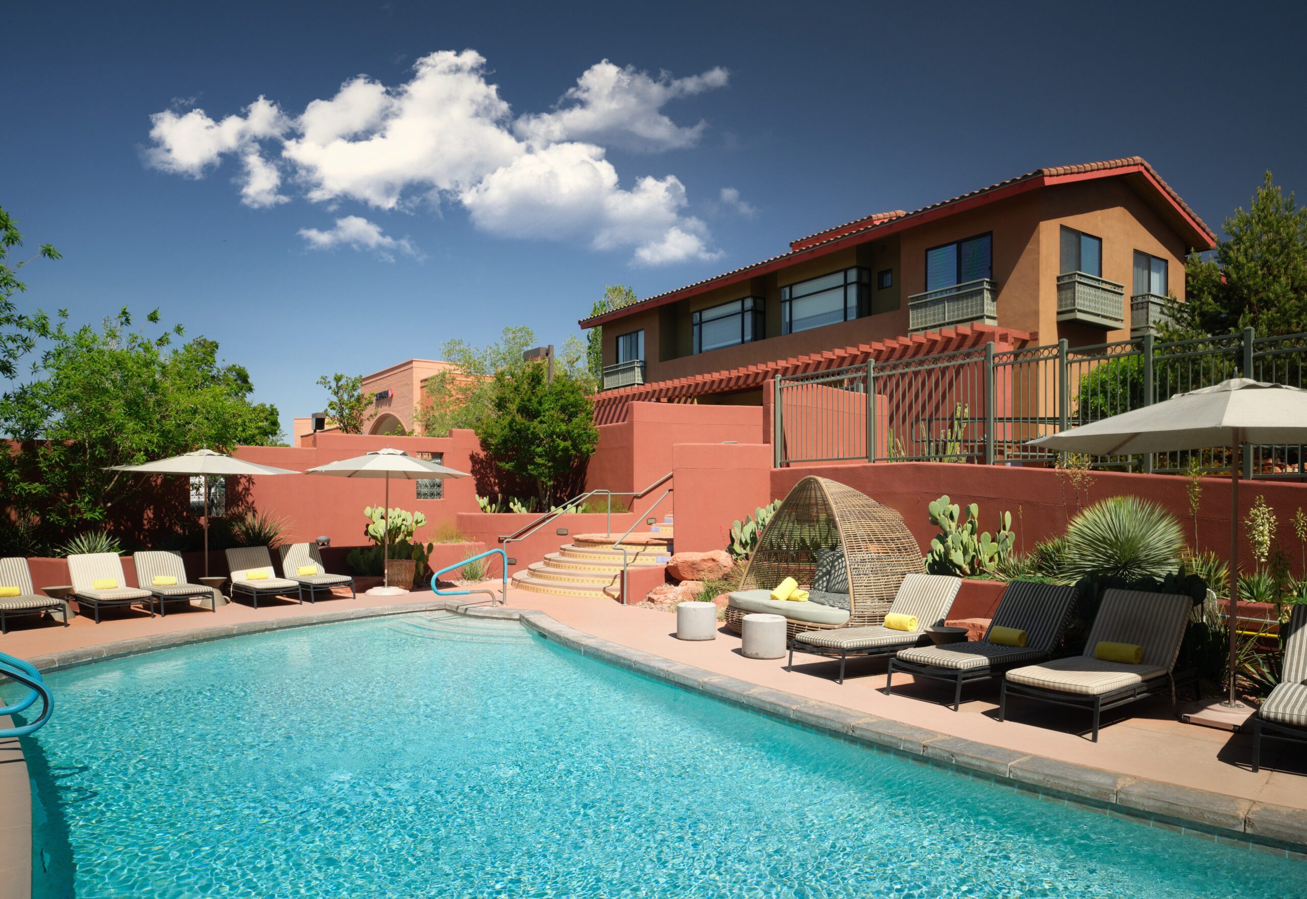 Sedona Wilde pool with lounging chairs and seating area