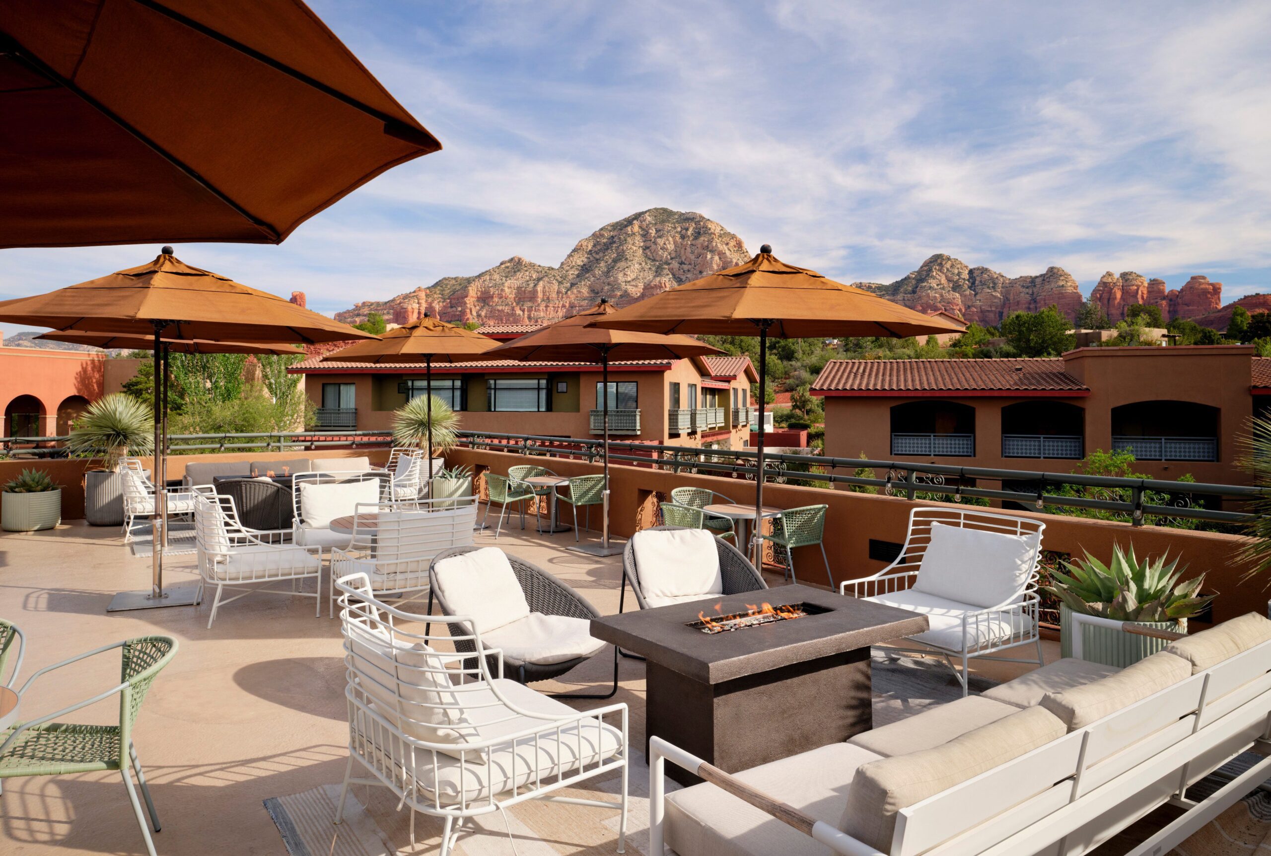 Sedona Wilde rooftop on beautiful sunny day with open fire seating areas